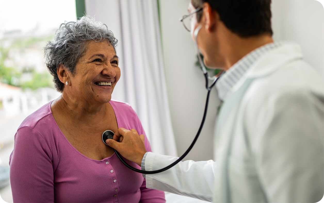 A doctor using a stethescope