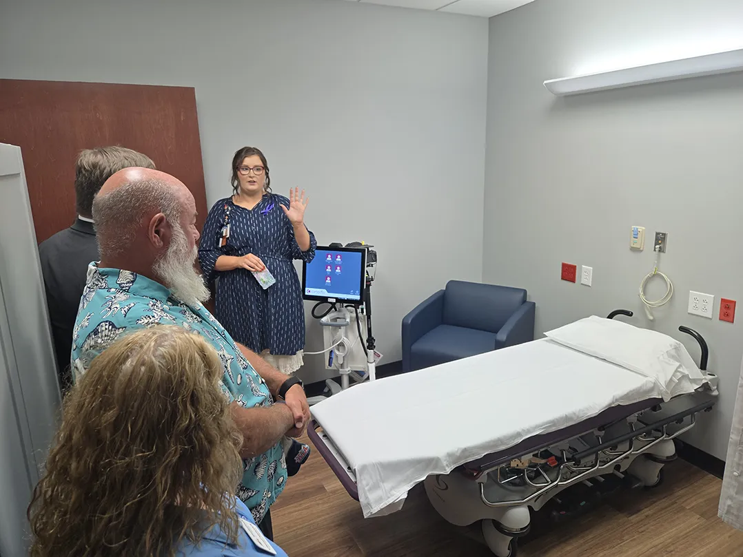 One of the Center of Hope's SANE nurses gives a tour of the exam room