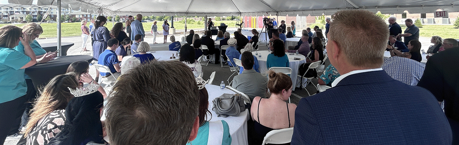 Kelly Braverman, Witham President and CEO, addresses the crowd at the Center of Hope Grand Opening