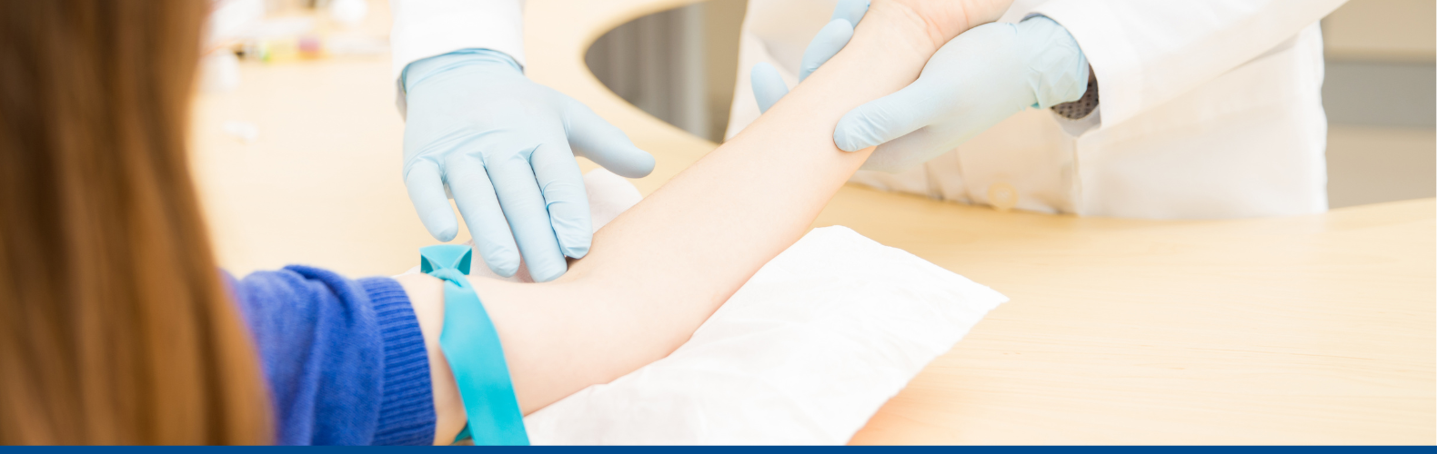 A person preparing to have their blood drawn