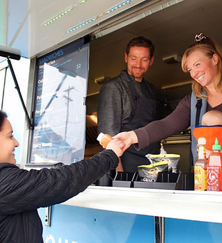 Person purchasing food from Grace Food Truck.