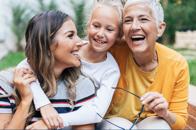 three women ranging in age from young to old