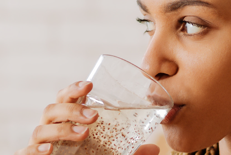 A lady drinking water