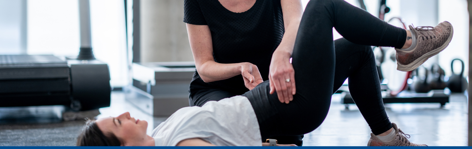 A woman and her physical therapist