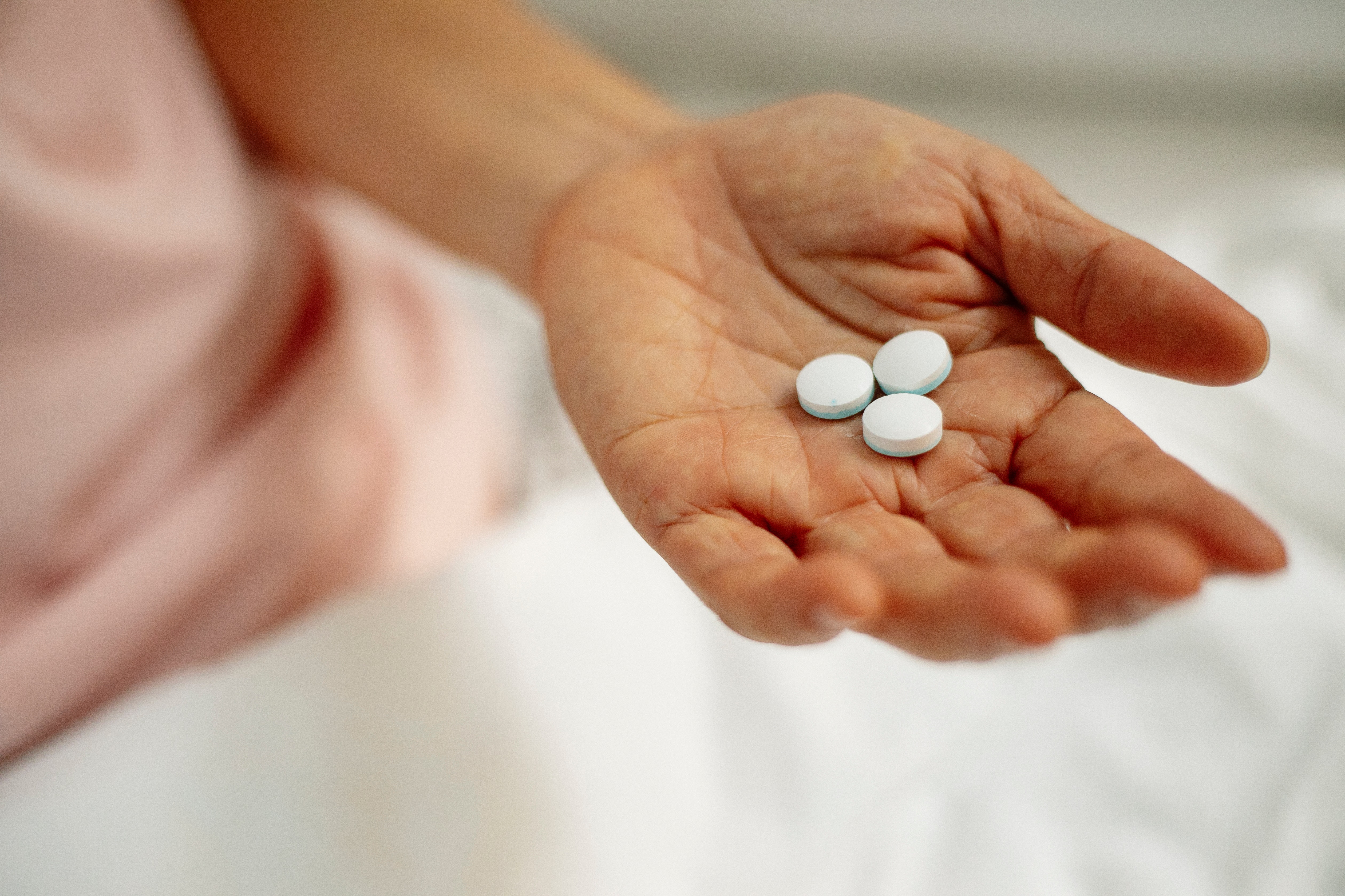 Medication in palm of hand