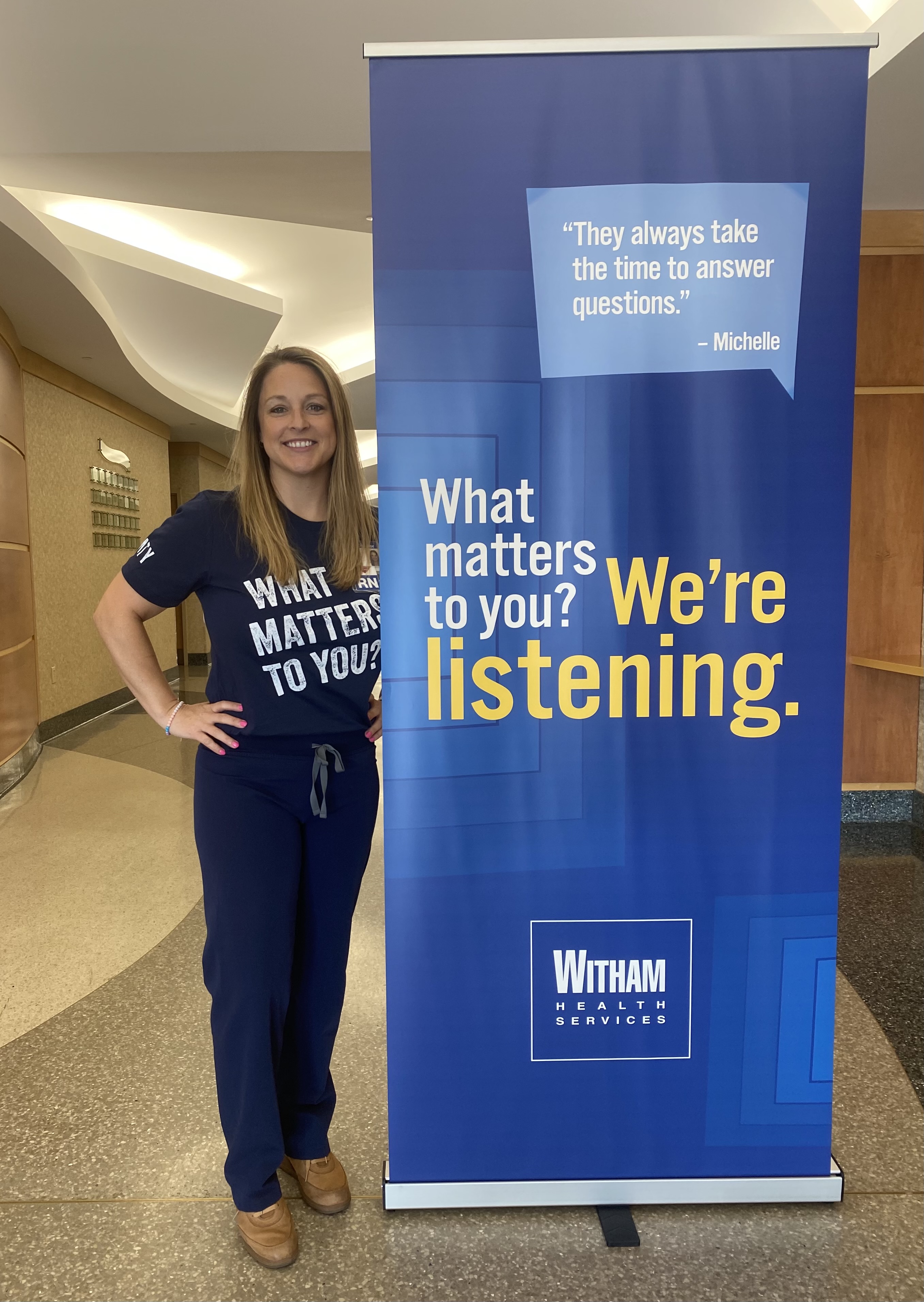 Becky with WMTY sign
