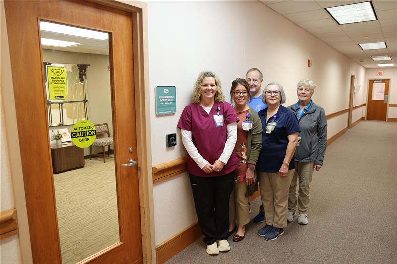 Witham volunteers helped fund new automatic door openers