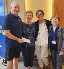 DQ presenting check to Witham