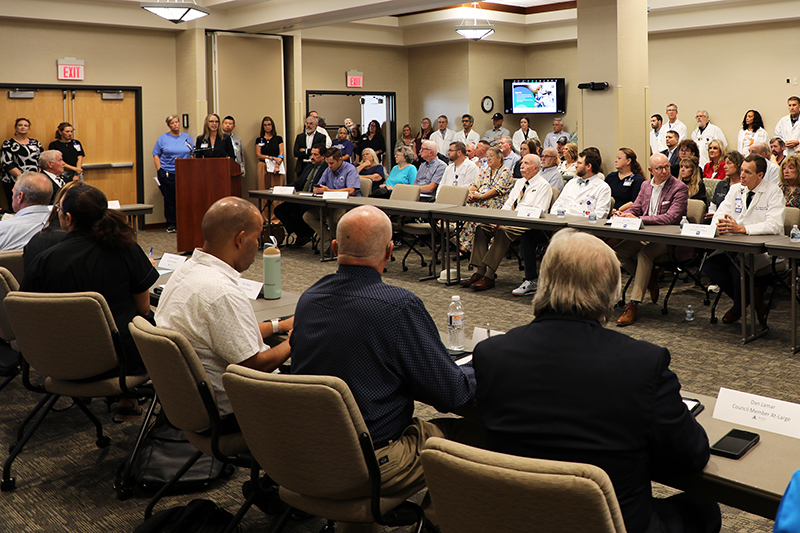 Kelly Braverman, Witham President and CEO, addresses the public hearing. 