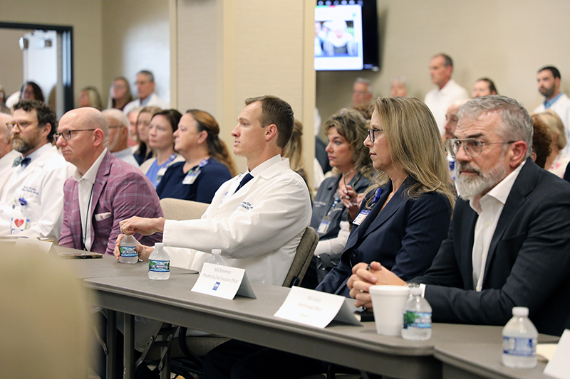 Dan Sellers, Witham CFO, Wm. Ross Strong, M.D., Witham CMO, Kelly Braverman, Witham President and CEO, and Rich Church, Parkview Chief Strategy Officer listen intently during the public hearing. 